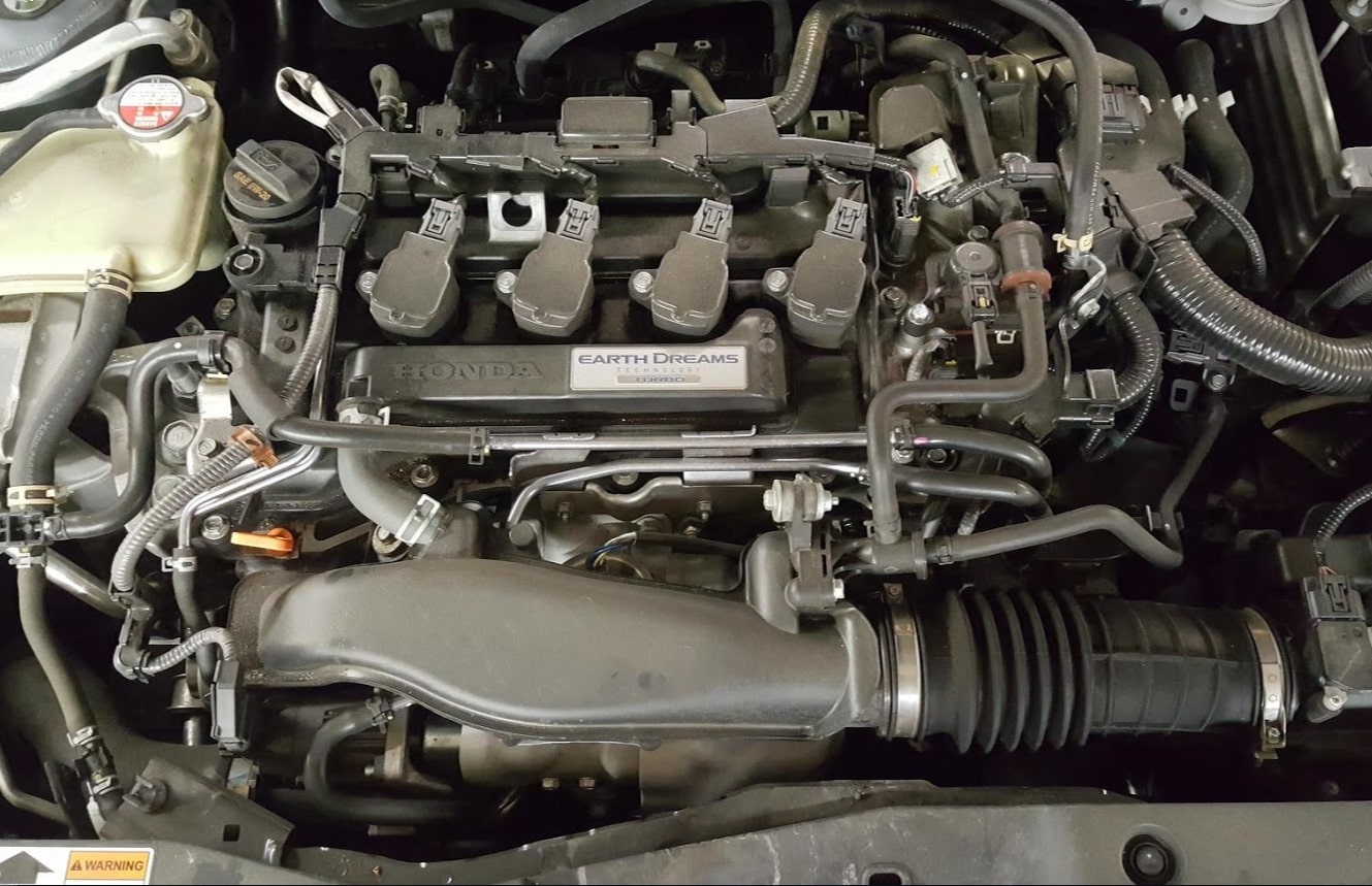 Image of a car engine, showcasing the intricate components that power the vehicle